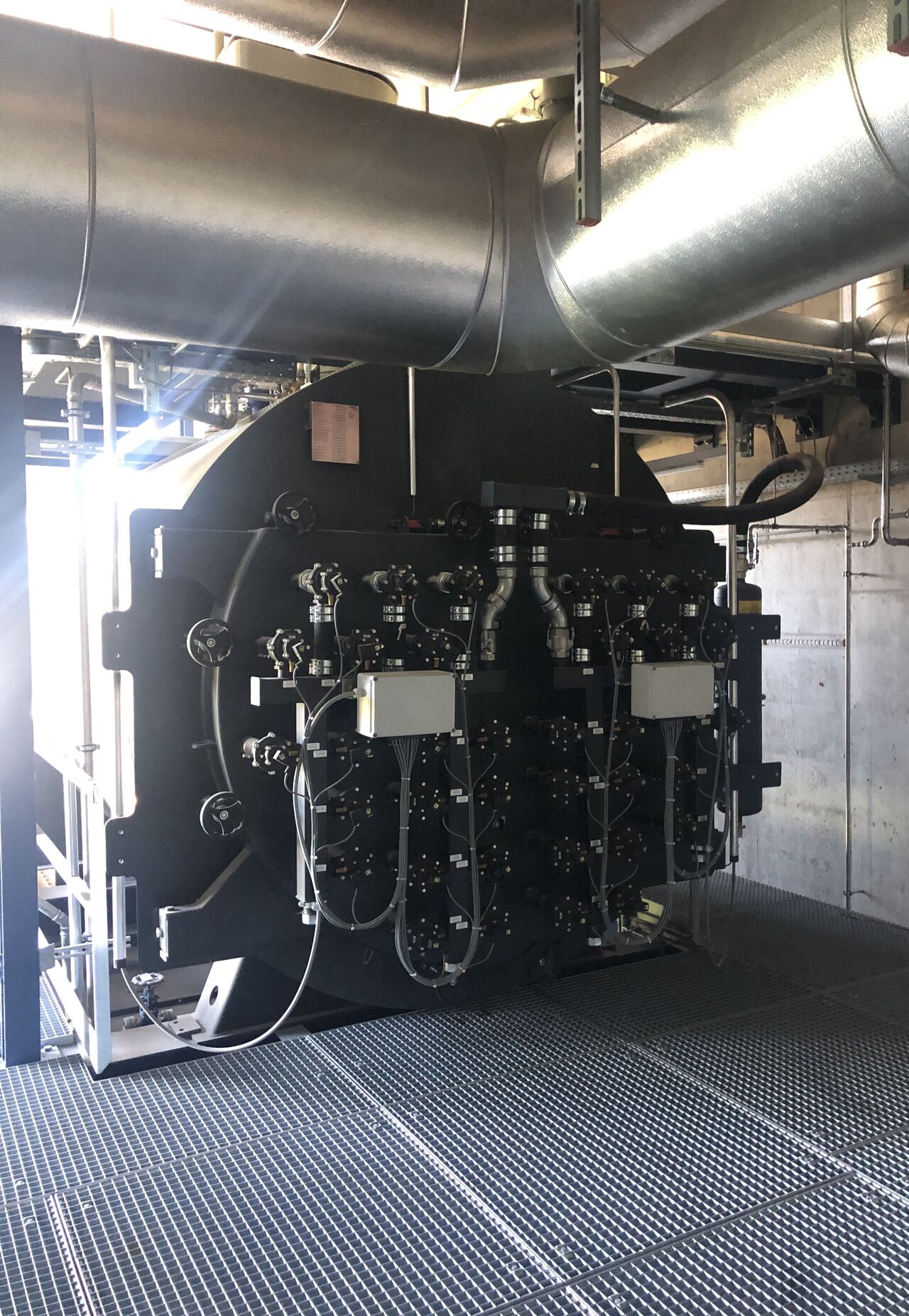 news-co2-neutral‑3 CO2 Neutralität Holzfeuerungsanlage
